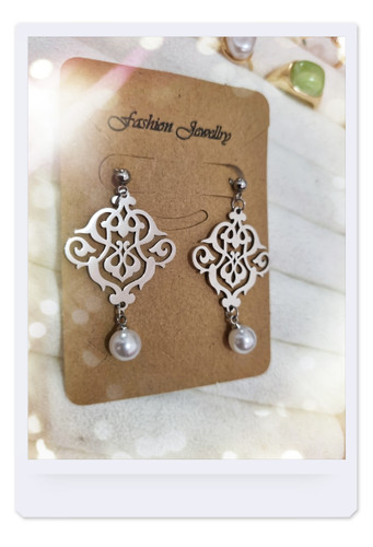 گوشواره اسلیمی نقره ای استیل